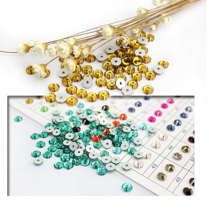sew on rhinestone with one hole